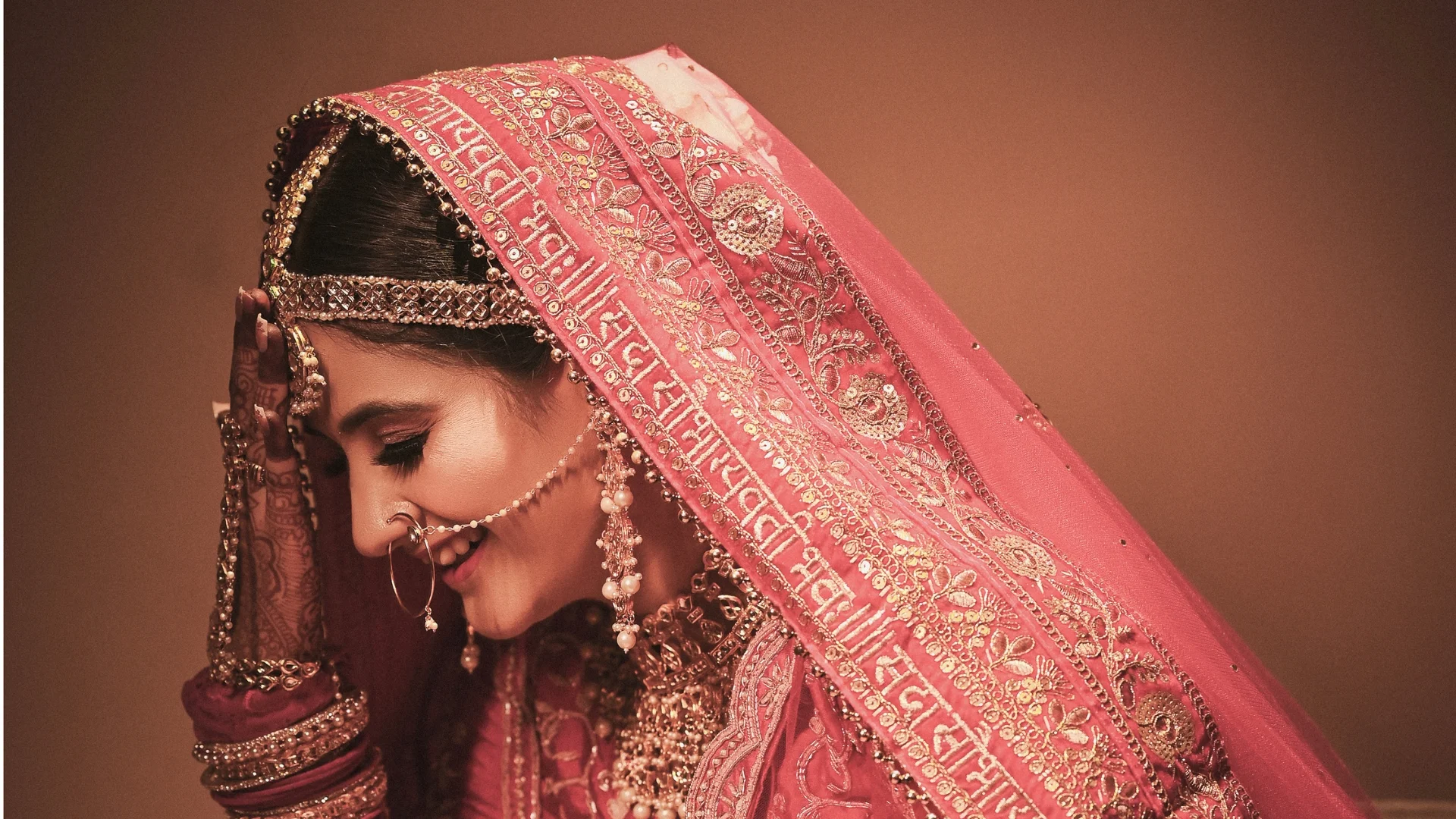 Premium bridal portrait photography by Indo Frames, showcasing bridal makeup, jewellery and traditional Indian wedding attire.