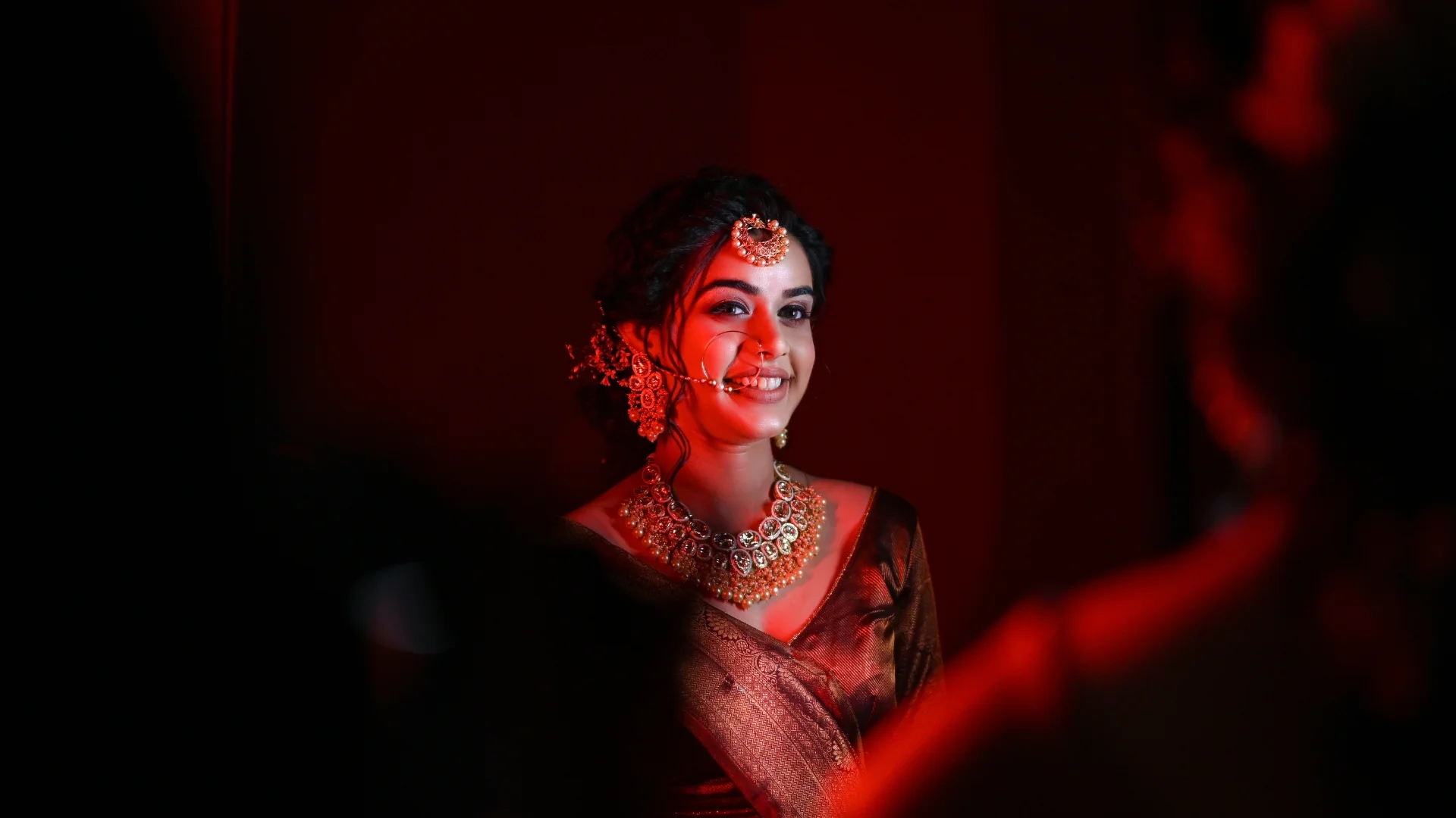 Creative bridal portrait with dramatic lighting by Indo Frames