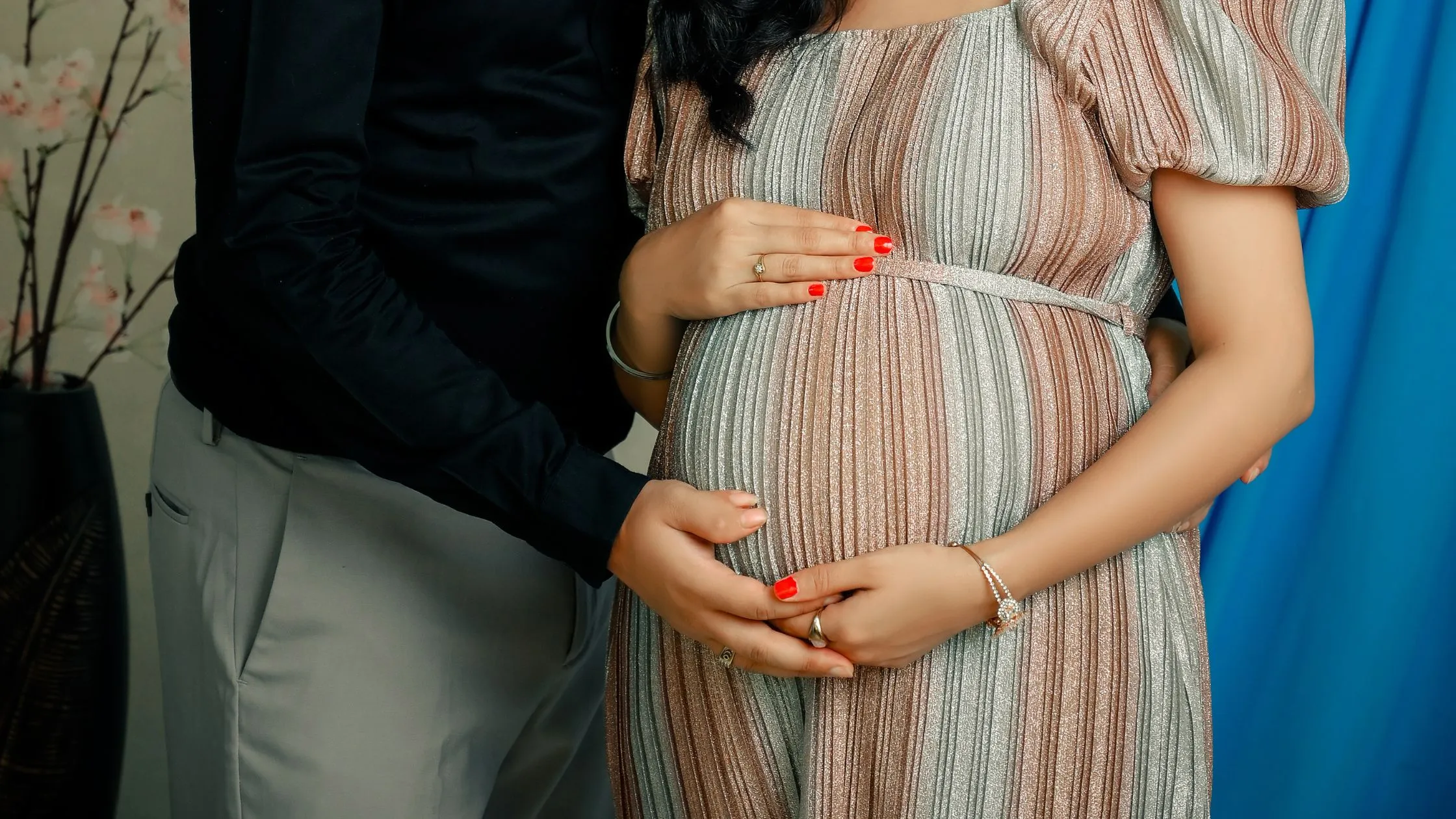 different creative maternity photoshoot baby bump pose captured beautifully by Indo Frames.
